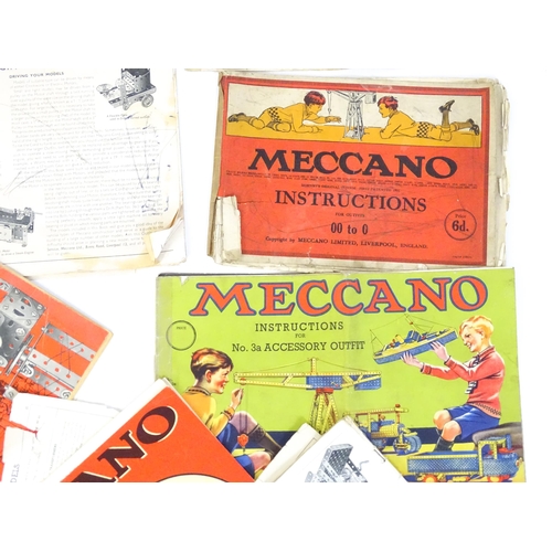 856 - Toys: A large quantity of assorted Meccano to include flat plates, girders, wheels, various instruct... 