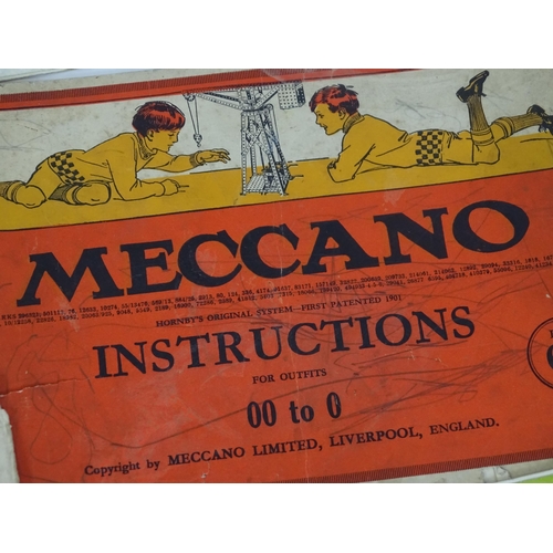 856 - Toys: A large quantity of assorted Meccano to include flat plates, girders, wheels, various instruct... 