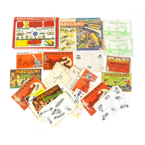 856 - Toys: A large quantity of assorted Meccano to include flat plates, girders, wheels, various instruct... 