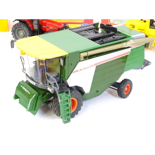 857 - Toys: A quantity of assorted Britains farmyard die cast and plastic toys / models to include tractor... 