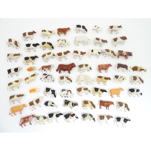 857 - Toys: A quantity of assorted Britains farmyard die cast and plastic toys / models to include tractor... 