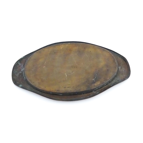 1000 - An Arts and Crafts oval copper tray with twin handles and hammered detail by Dryad Lester, stamped a... 