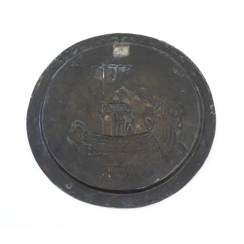 1012 - An Arts and Crafts copper charger with embossed decoration depicting a Viking ship titled under Norm... 