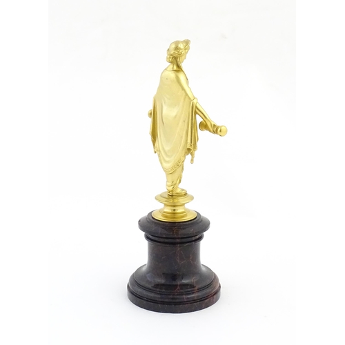 1013 - A late 19th / early 20thC Continental gilt bronze sculpture depicting an allegorical figure, possibl... 