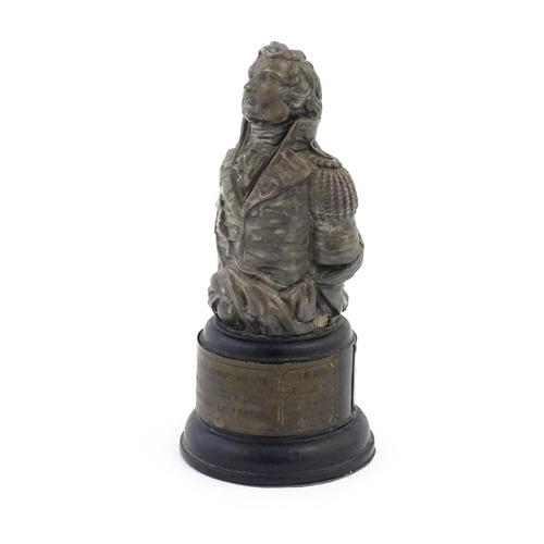 1016 - An early 20thC commemorative model of the figurehead of HMS Hastings, on a turned wooden base with t... 