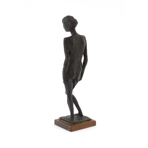 1017 - A 20thC bronze sculpture depicting a standing female nude, Linda, by Nigel Konstam (b. 1932). Artist... 