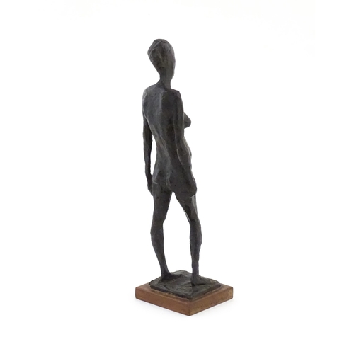 1017 - A 20thC bronze sculpture depicting a standing female nude, Linda, by Nigel Konstam (b. 1932). Artist... 