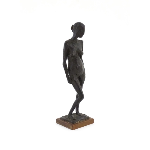 1017 - A 20thC bronze sculpture depicting a standing female nude, Linda, by Nigel Konstam (b. 1932). Artist... 