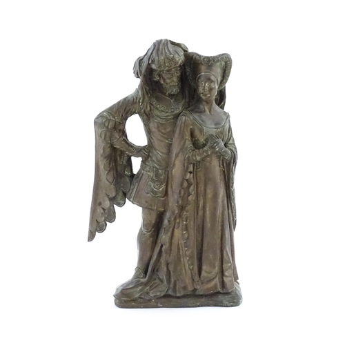 1018 - A 20thC cast doorstop / door porter depicting a medieval nobleman and woman, by D.H. Morton for Marc... 