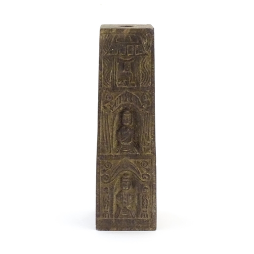 1049 - An Asian composite stone column / base of tapering form decorated with figures and a pagoda style bu... 