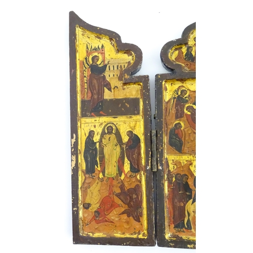 1050 - A 19thC Russian Orthodox carved wooden triptych icon with eight tempera depictions of events in the ... 