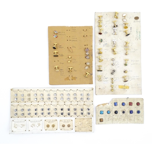 1056 - A quantity of assorted 20thC stud / button and cufflink salesman samples to include various shapes a... 