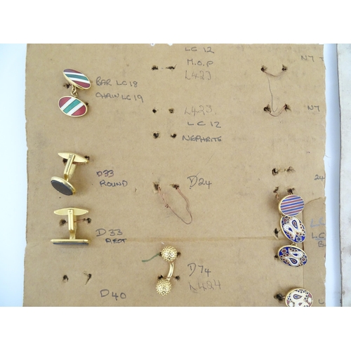 1056 - A quantity of assorted 20thC stud / button and cufflink salesman samples to include various shapes a... 