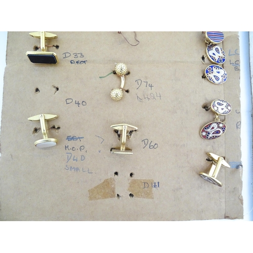 1056 - A quantity of assorted 20thC stud / button and cufflink salesman samples to include various shapes a... 