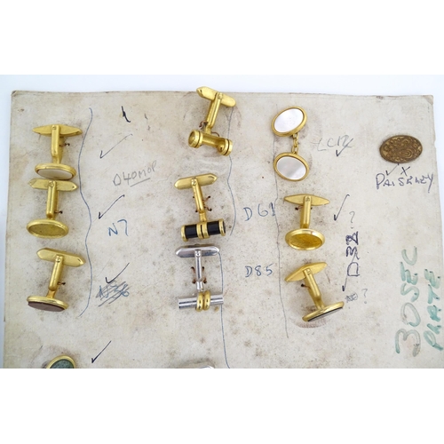 1056 - A quantity of assorted 20thC stud / button and cufflink salesman samples to include various shapes a... 