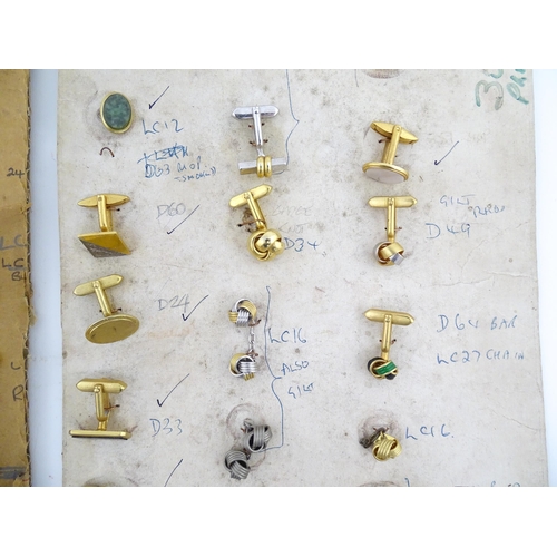 1056 - A quantity of assorted 20thC stud / button and cufflink salesman samples to include various shapes a... 