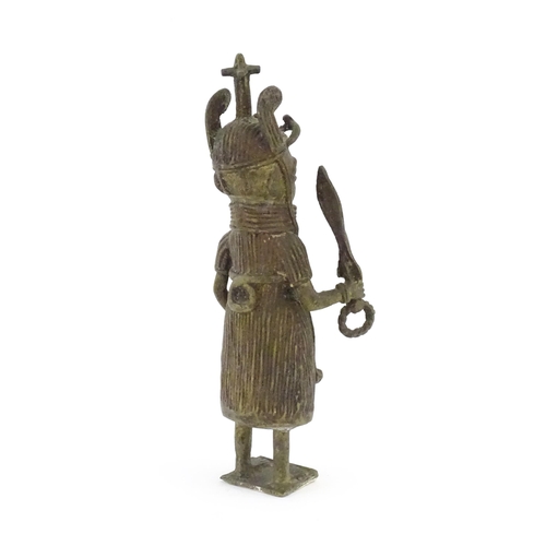 1076 - Ethnographic / Native / Tribal : A cast Benin bronze figure depicting the Oba of Benin holding a swo... 