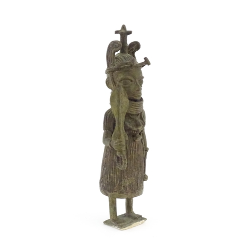 1076 - Ethnographic / Native / Tribal : A cast Benin bronze figure depicting the Oba of Benin holding a swo... 