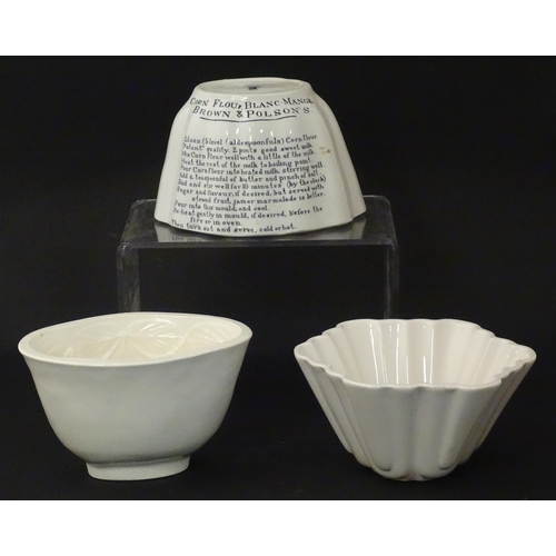 1080 - Three early 20thC ceramic jelly / blancmange moulds, to include a Copeland example with strawberry d... 