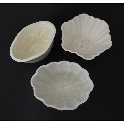 1080 - Three early 20thC ceramic jelly / blancmange moulds, to include a Copeland example with strawberry d... 