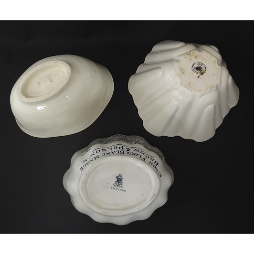 1080 - Three early 20thC ceramic jelly / blancmange moulds, to include a Copeland example with strawberry d... 