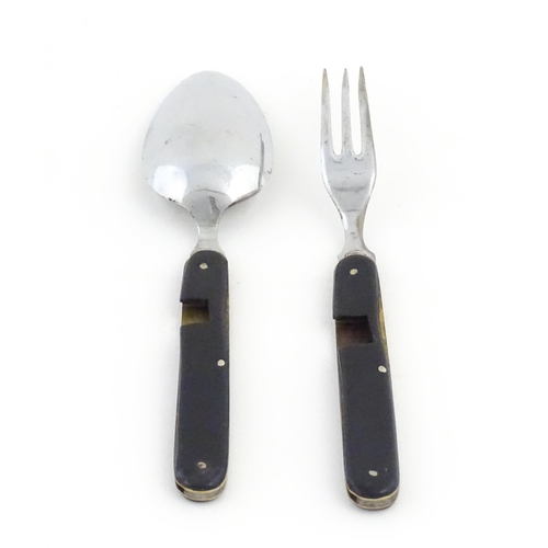 1085 - A 20thC campaign style folding spoon and fork. (2)