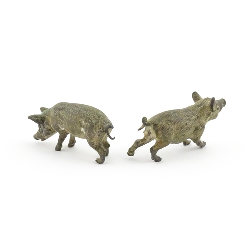 1116A - Two Continental cold painted bronze models of pigs / boars. Stamped Geschutzt under. Approx. 2