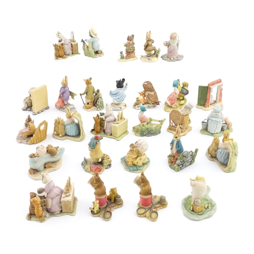 936 - A quantity of Border Fine Arts Beatrix Potter figures to include Peter Rabbit in the Garden BP1, Old... 