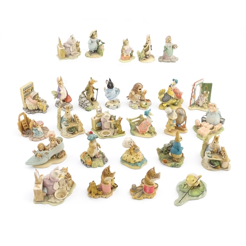 936 - A quantity of Border Fine Arts Beatrix Potter figures to include Peter Rabbit in the Garden BP1, Old... 
