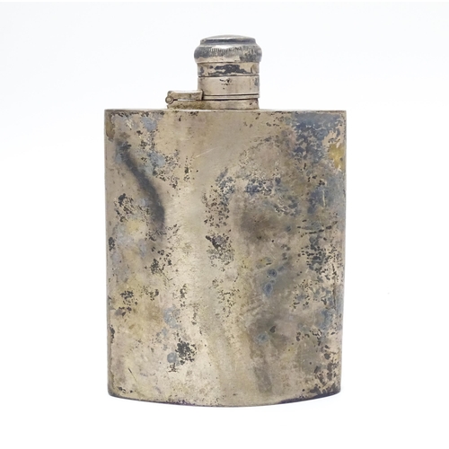 536 - A silver hip flask hallmarked Birmingham 1944, maker F. Burton Crosbee. Approx. 5