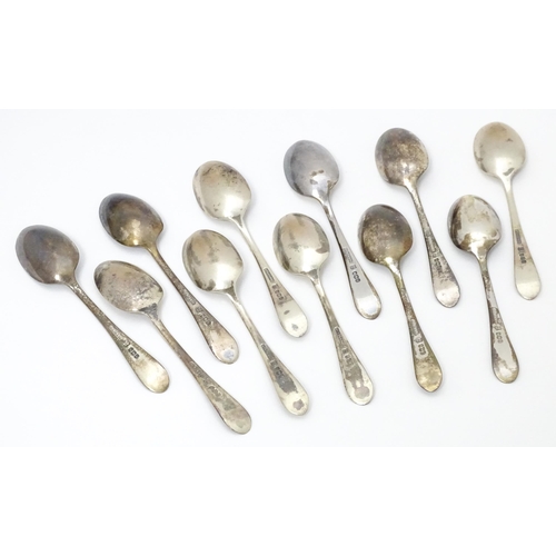 539 - Eleven silver teaspoons with engraved armorials to handles, hallmarked Sheffield 1918, maker Cooper ... 