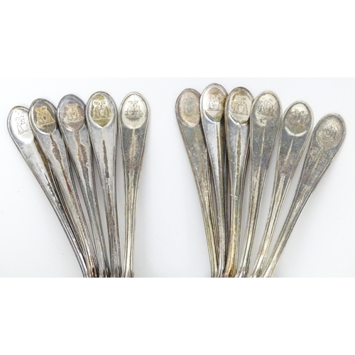 539 - Eleven silver teaspoons with engraved armorials to handles, hallmarked Sheffield 1918, maker Cooper ... 