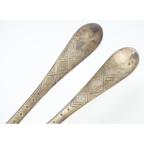 545 - A pair of Geo III Scottish silver berry spoons with engraved armorial to handle, hallmarked Edinburg... 