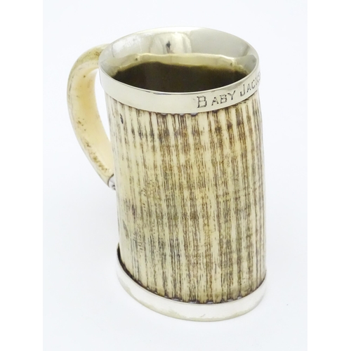 546 - A christening mug the body formed from antler with silver plate mounts. Approx. 4