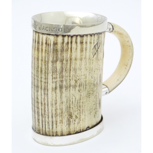 546 - A christening mug the body formed from antler with silver plate mounts. Approx. 4