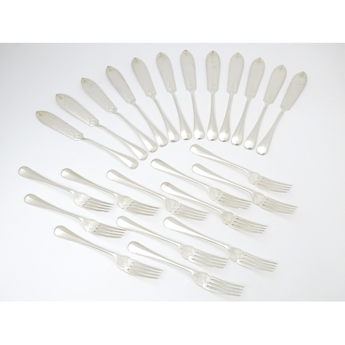 547 - A Victorian twelve place set of silver fish eats, comprising 12 knives and 12 forks, hallmarked Shef... 