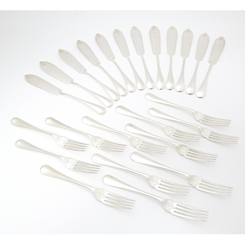 547 - A Victorian twelve place set of silver fish eats, comprising 12 knives and 12 forks, hallmarked Shef... 