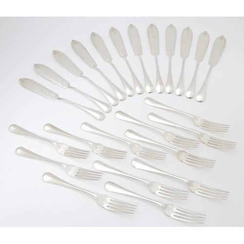 547 - A Victorian twelve place set of silver fish eats, comprising 12 knives and 12 forks, hallmarked Shef... 