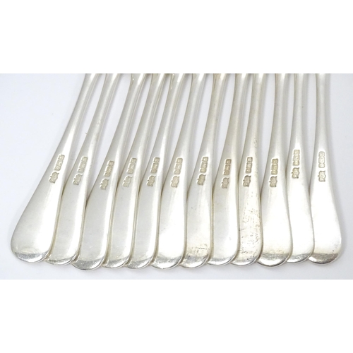 547 - A Victorian twelve place set of silver fish eats, comprising 12 knives and 12 forks, hallmarked Shef... 