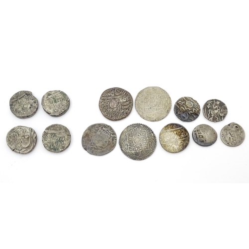 784B - Coins: A quantity of old coins to include Indian Rupees, Nepalese examples, etc. (13)