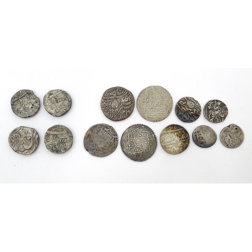 784B - Coins: A quantity of old coins to include Indian Rupees, Nepalese examples, etc. (13)