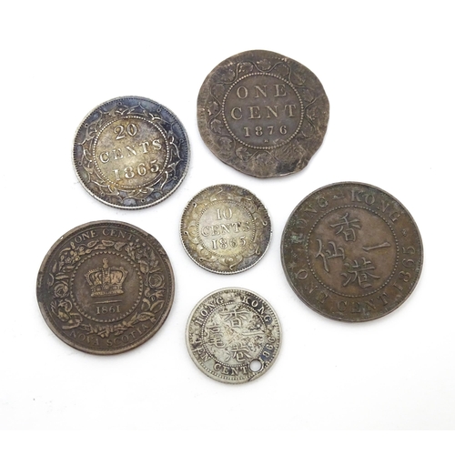 787A - Coins: A quantity of assorted World coins to include from China, Hong Kong, South Africa, Canada, Am... 