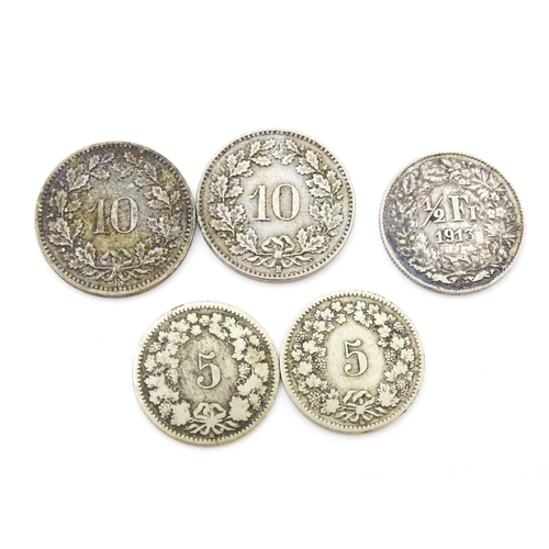 789 - Coins: A quantity of assorted coins from Switzerland to include some silver examples (24)