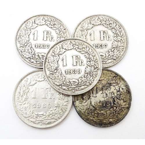 789 - Coins: A quantity of assorted coins from Switzerland to include some silver examples (24)