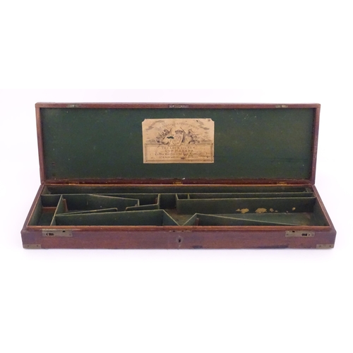 1216 - A 19thC mahogany gun motor case brass mounts, the green baize-lined interior fitted for a side by si... 