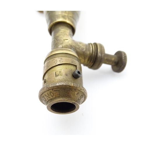 1221 - A 20thC double powder flask, constructed from horn with brass fittings and 2 1/2 - 3 dram measures. ... 