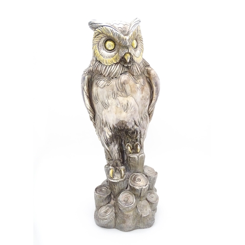 433 - A large filled model of an owl with silver and white metal covering. Signed 'A. Giannelli 1972'. App... 