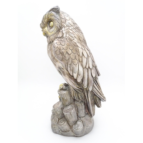 433 - A large filled model of an owl with silver and white metal covering. Signed 'A. Giannelli 1972'. App... 