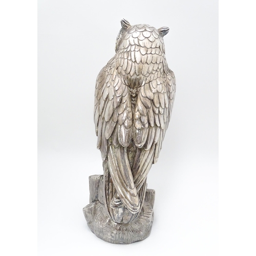 433 - A large filled model of an owl with silver and white metal covering. Signed 'A. Giannelli 1972'. App... 