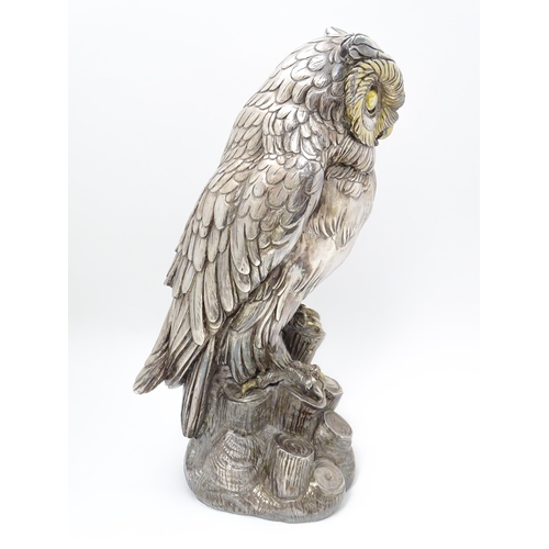 433 - A large filled model of an owl with silver and white metal covering. Signed 'A. Giannelli 1972'. App... 